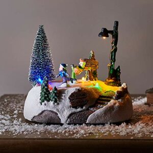 Lights4fun, Inc. Christmas Village Ice Skating Pond Animated Pre-Lit Multicolored LED Battery Operated Light Up Holiday Decoration